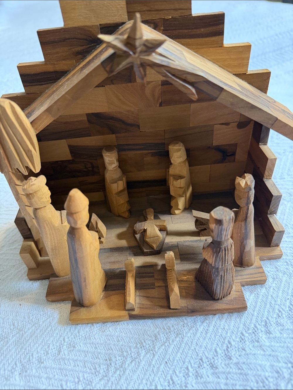 Hand-Carved Wooden Nativity Scene Set in Natural Wood